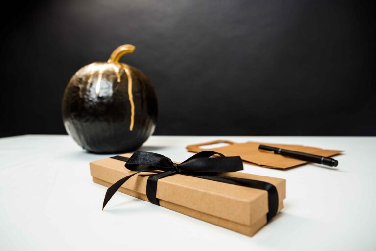 halloween-decor-white-table-black-wall_11zon-1.jpg