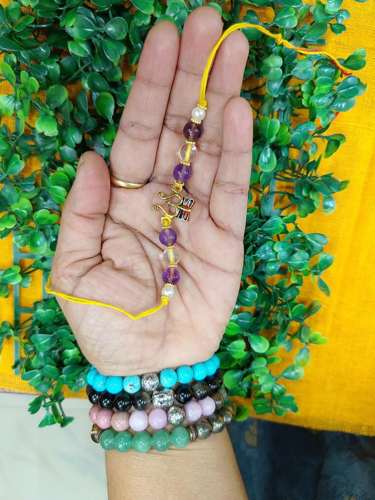 Amethyst And Clear Quartz With Trishul Rakhi