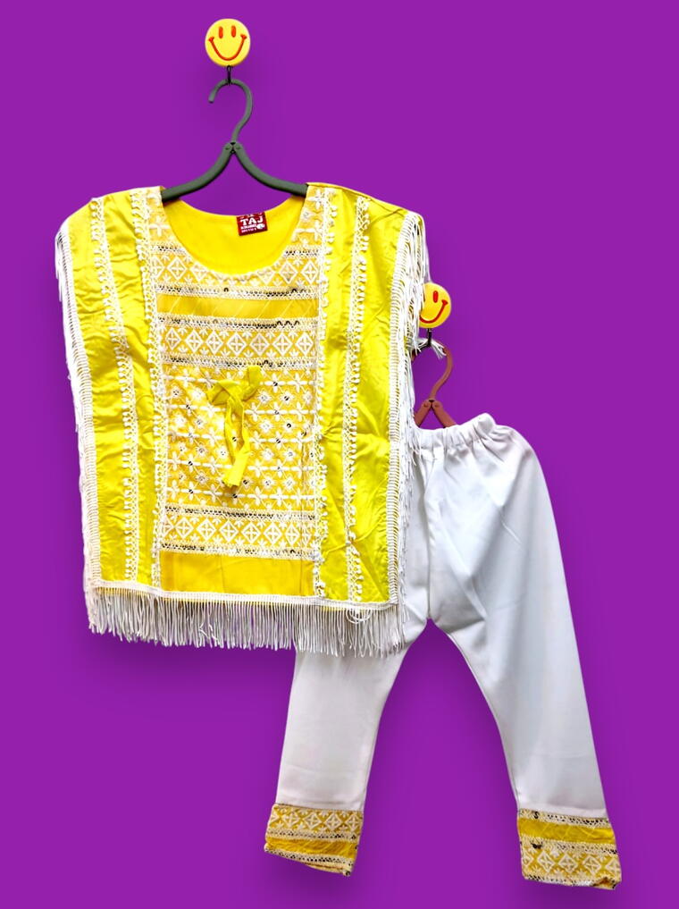 Vibrant Yellow Tassel Poncho with White Pants