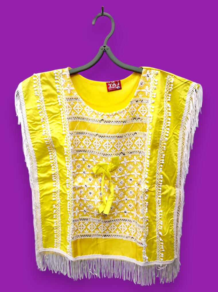 Vibrant Yellow Tassel Poncho with White Pants