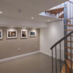 How to Create a Gallery Wall Using an Art Hanging System?