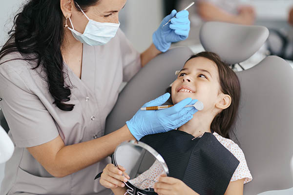 Why Regular Visits to a Dentist Are Crucial for Oral Health