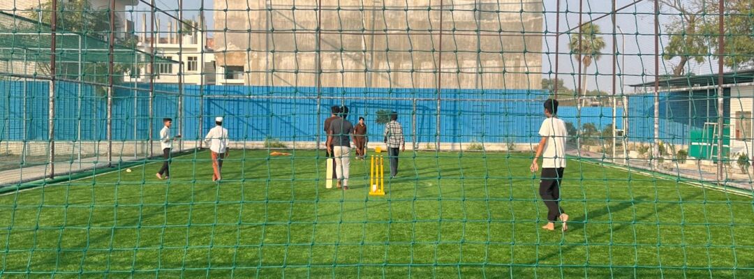 Box cricket and football turf practice pitches and bowling machine