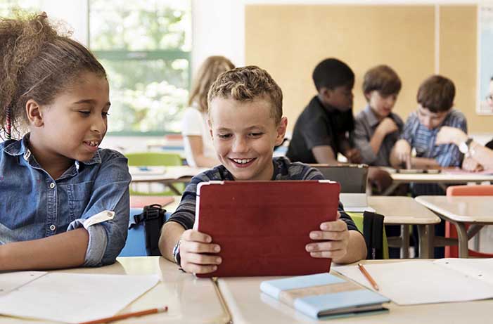 The more girls in class, the better is boys’ performance