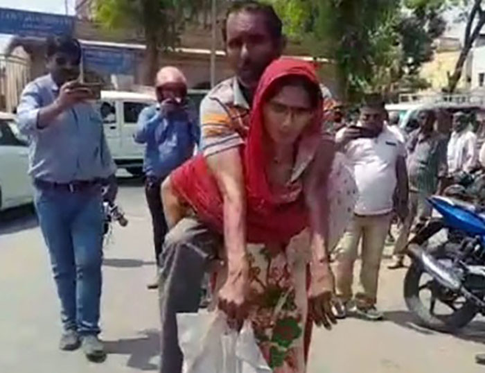 Mathura: CMO issues disability certificate after wife carries husband on back
