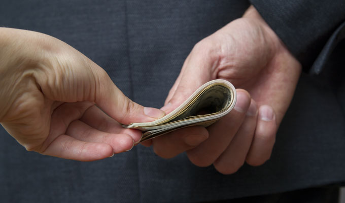 Income Tax Commissioner arrested for bribery