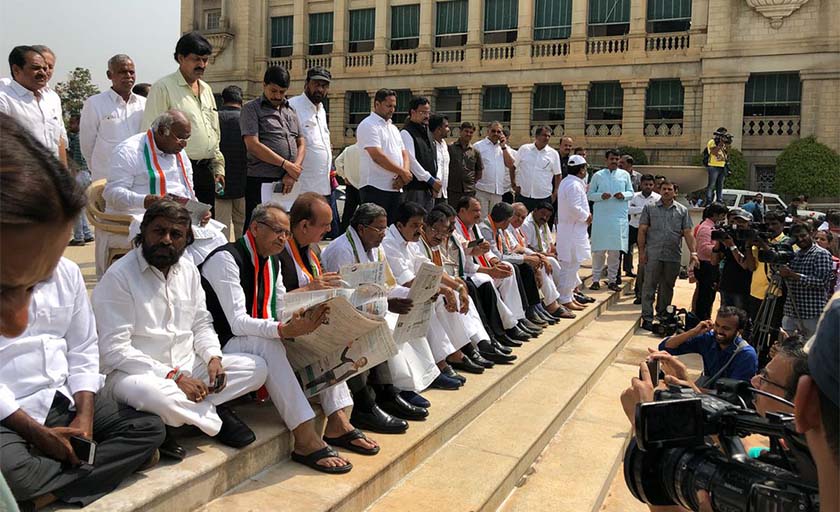 Congress stages protest as Yeddyurappa is sworn in as CM Congress stages protest as Yeddyurappa is sworn in as CM