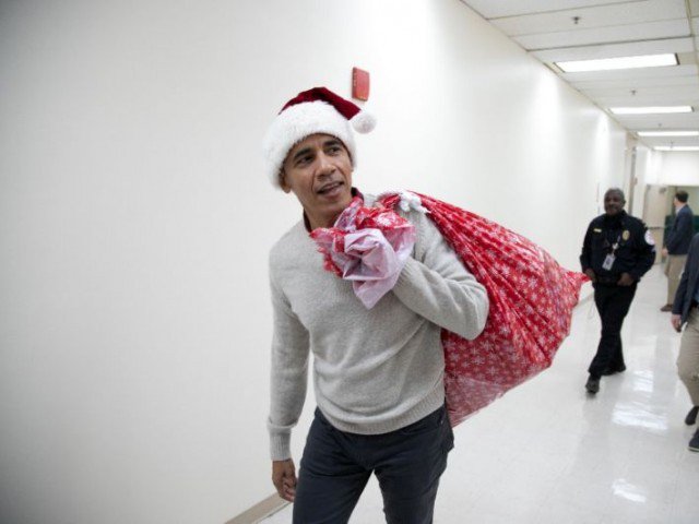 Obama delights sick children as Santa in Washington Obama delights sick children as Santa in Washington