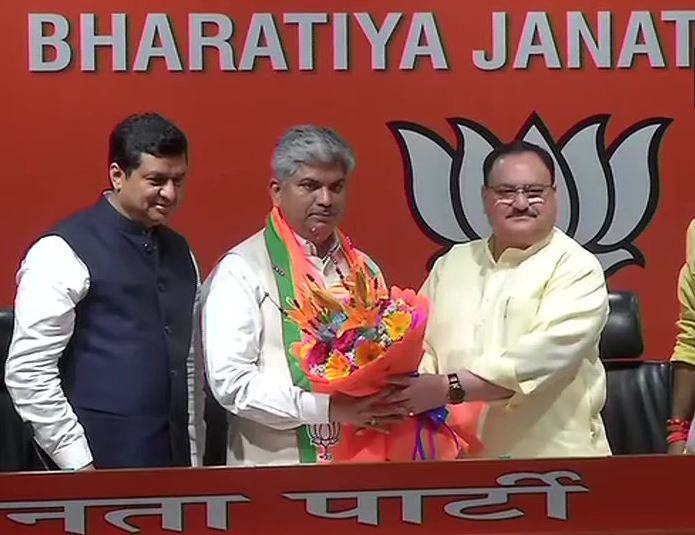 Former Congress MP in Telangana Ananda Bhaskar Rapolu joins BJP