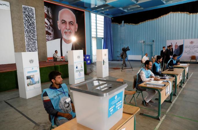 Afghan voters brave attacks as presidential election begins
