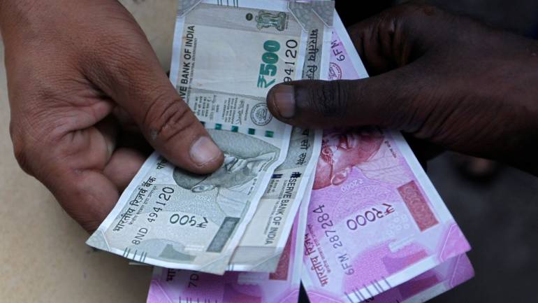 Rupee rises 21 paise to 70.64 against USD in early trade