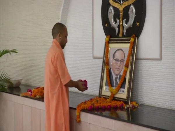 UP Chief Minister Yogi Adityanath pays floral tribute to BR Ambedkar on his birth anniversary