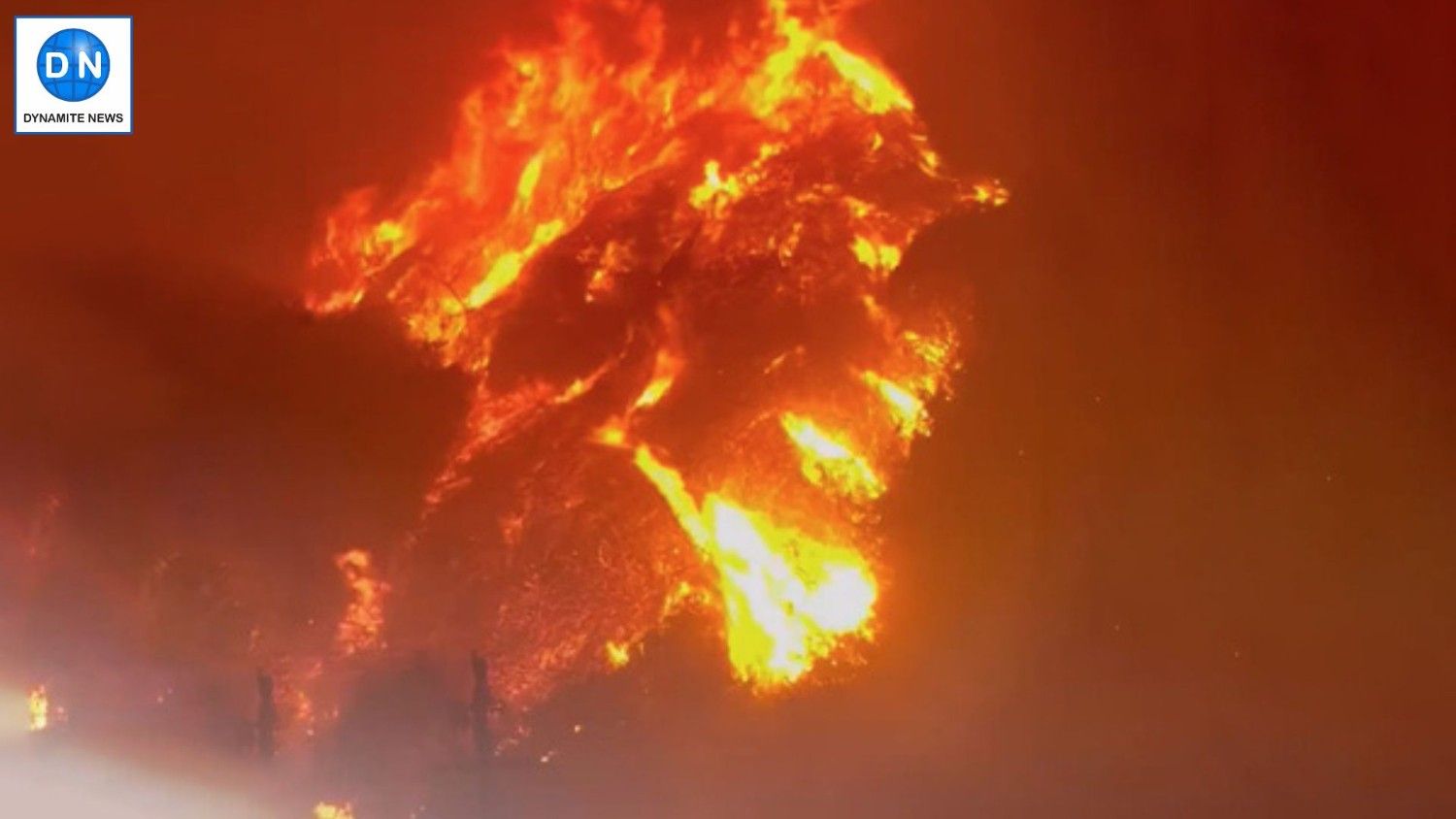Thousands evacuate as fast-growing wildfires devastate Southern California amid harsh winds