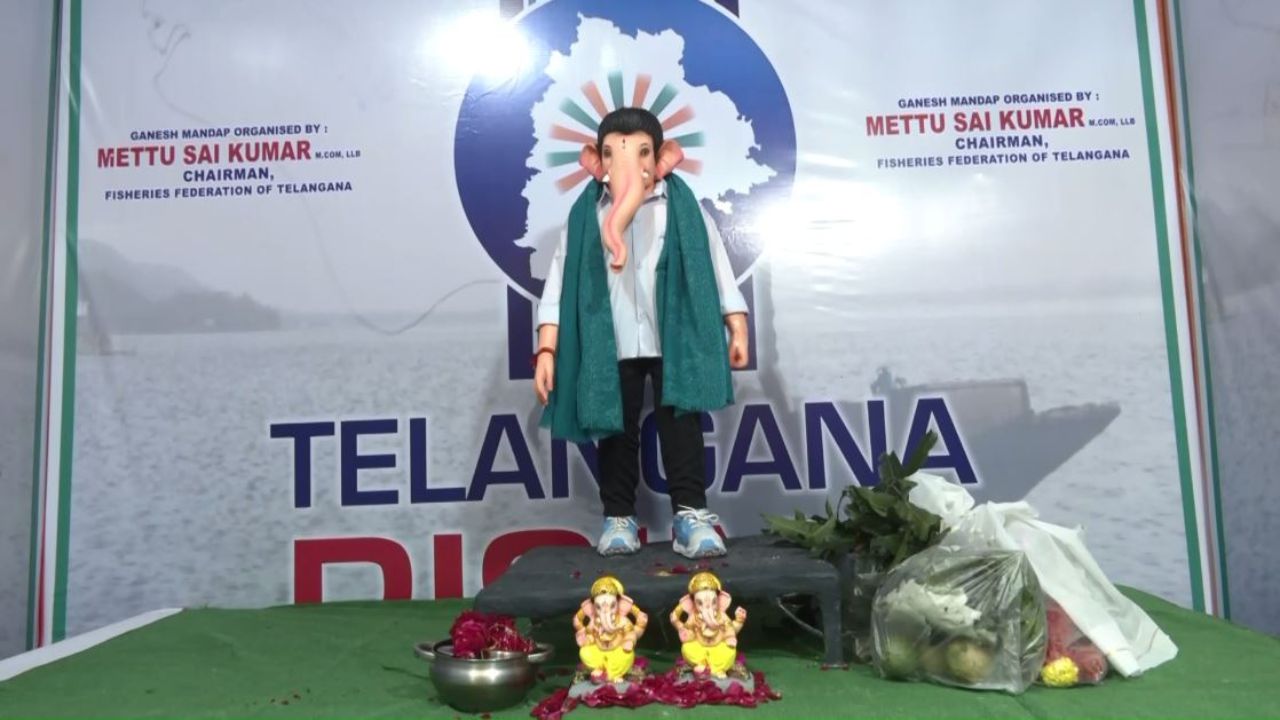 Hyderabad: White shirt, black pants and green shawl on shoulder… Revanth Reddy look of Ganesh idol