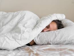 Why Sleeping Under a Blanket Feels So Good: The science behind this cozy habit