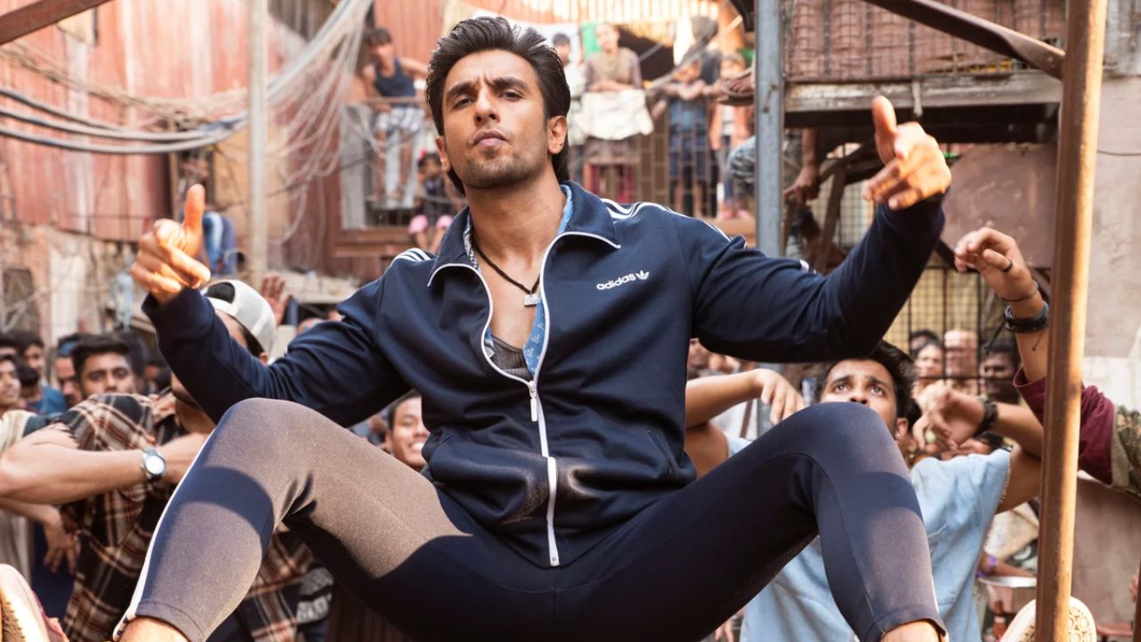 Murad Ahmed in Gully Boy: In a raw, grounded performance, Ranveer sported a simple, realistic look as an aspiring street rapper. His style featured basic, oversized T-shirts, worn-out denim, and kohl-rimmed eyes, which perfectly captured the essence of the character and the Mumbai street aesthetic. Murad Ahmed in Gully Boy: In a raw, grounded performance, Ranveer sported a simple, realistic look as an aspiring street rapper. His style featured basic, oversized T-shirts, worn-out denim, and kohl-rimmed eyes, which perfectly captured the essence of the character and the Mumbai street aesthetic.
