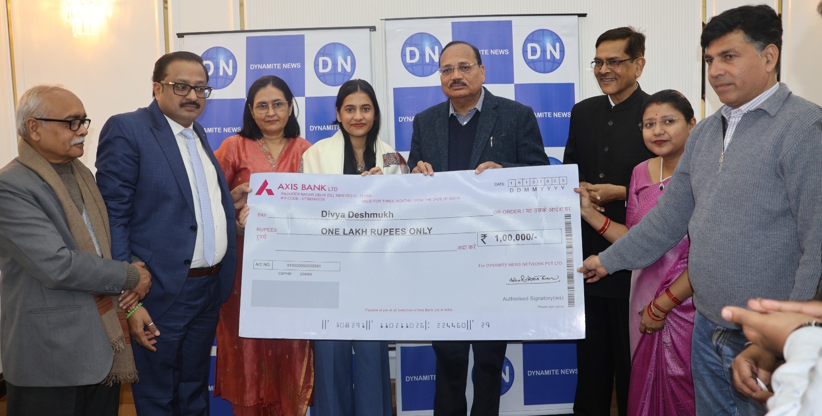 CJI Surya Kant with other dignitaries presenting the cheque of the Award Prize to Divya