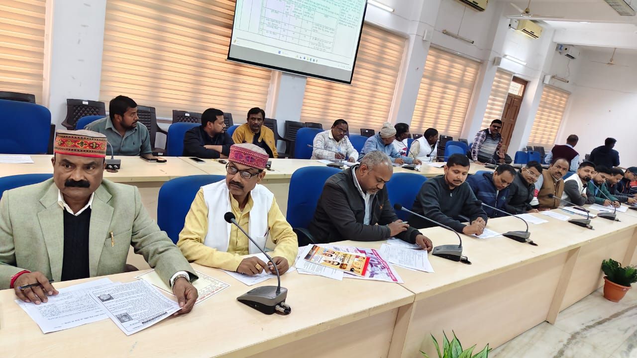 “Officials and entrepreneurs discussing pending loan applications and investment-related issues