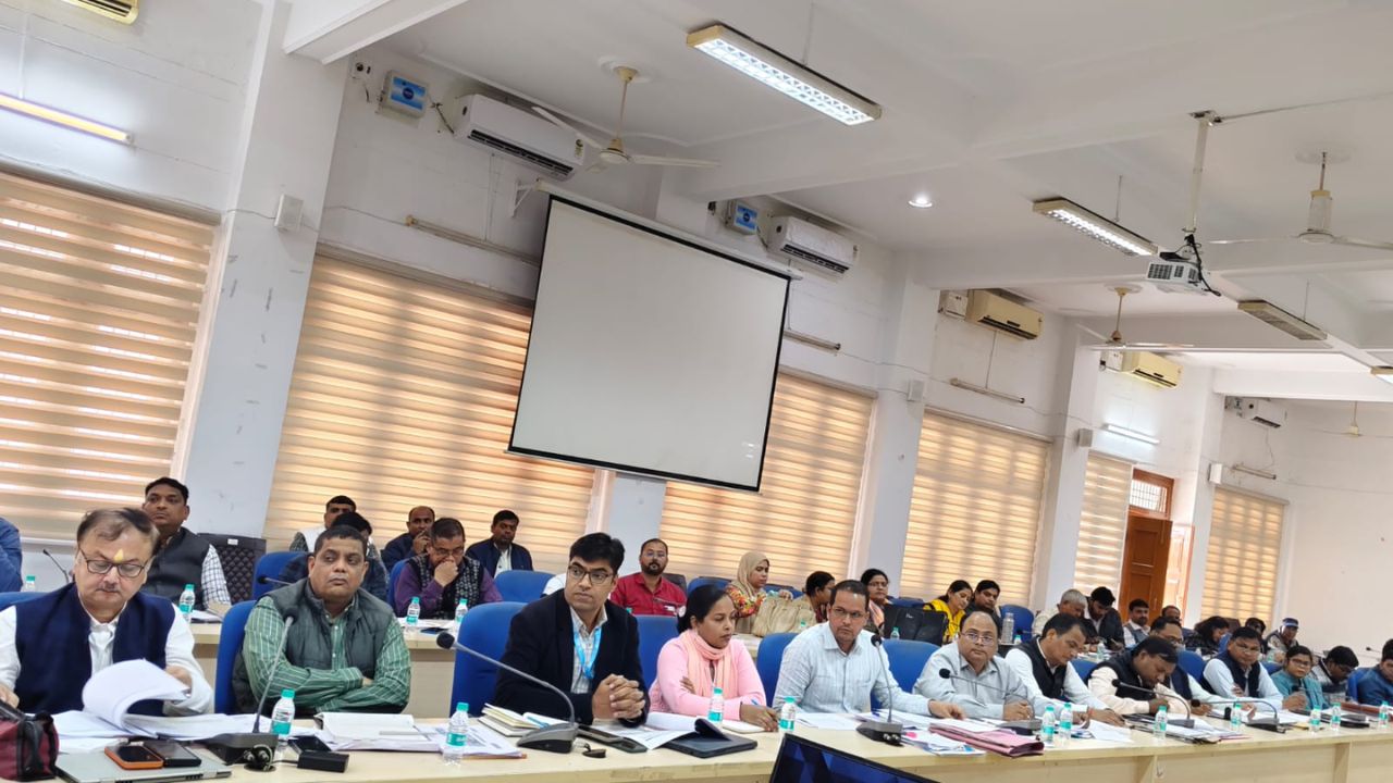 Officials participate in detailed administrative discussion