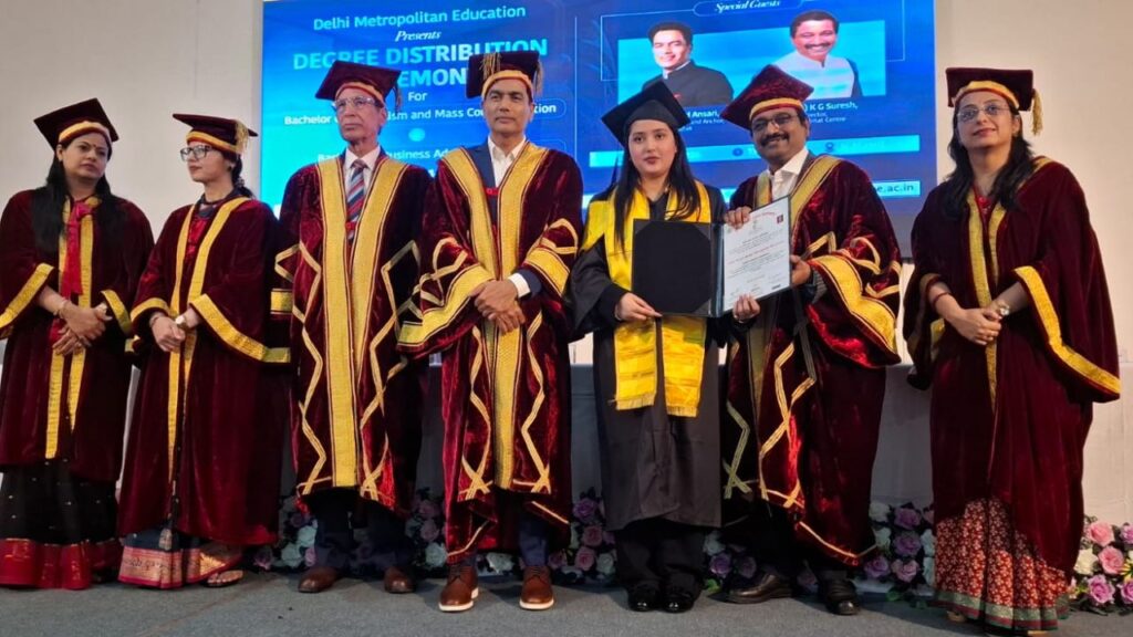 Dignitaries present degrees to a graduating student