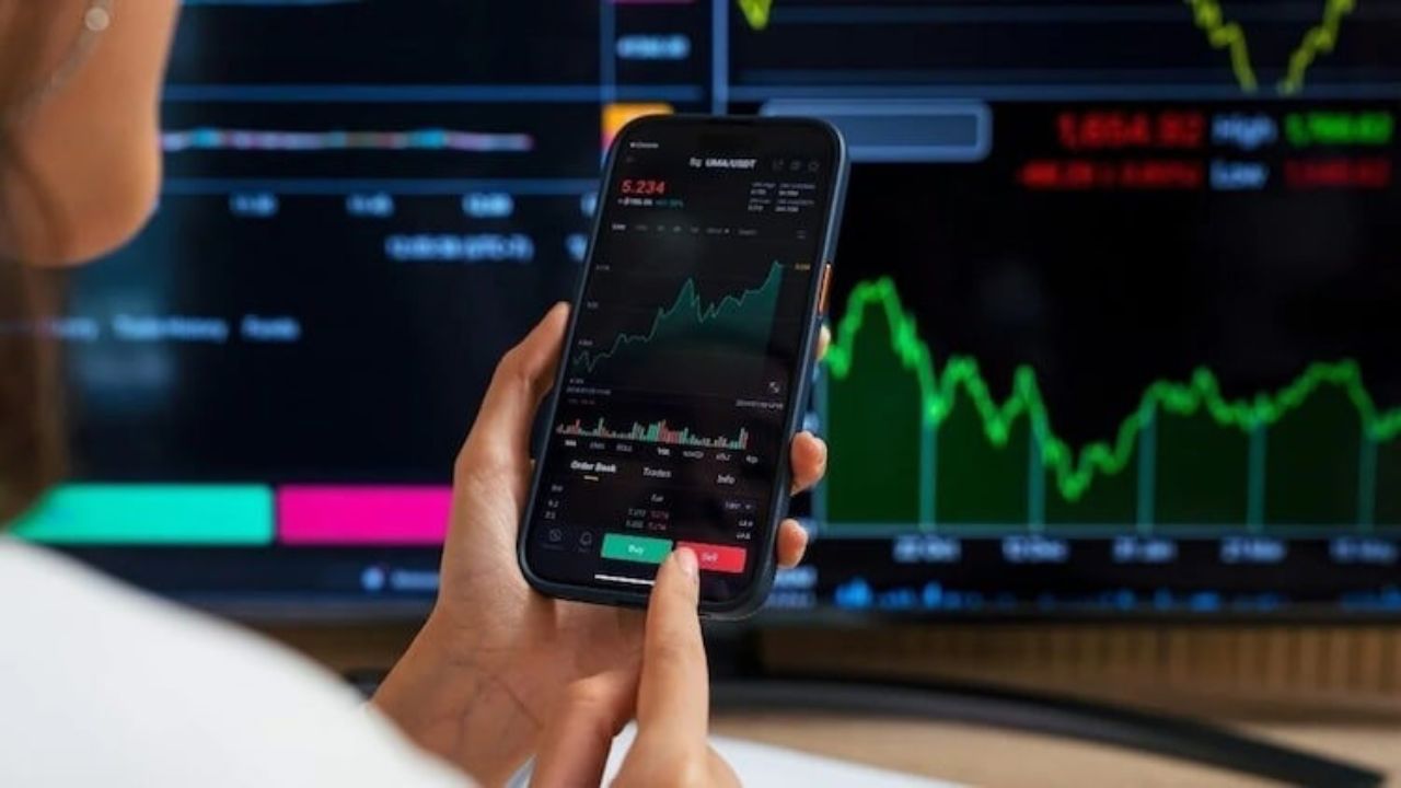 Markets start week on positive note; Sensex up, Rupee holds steady