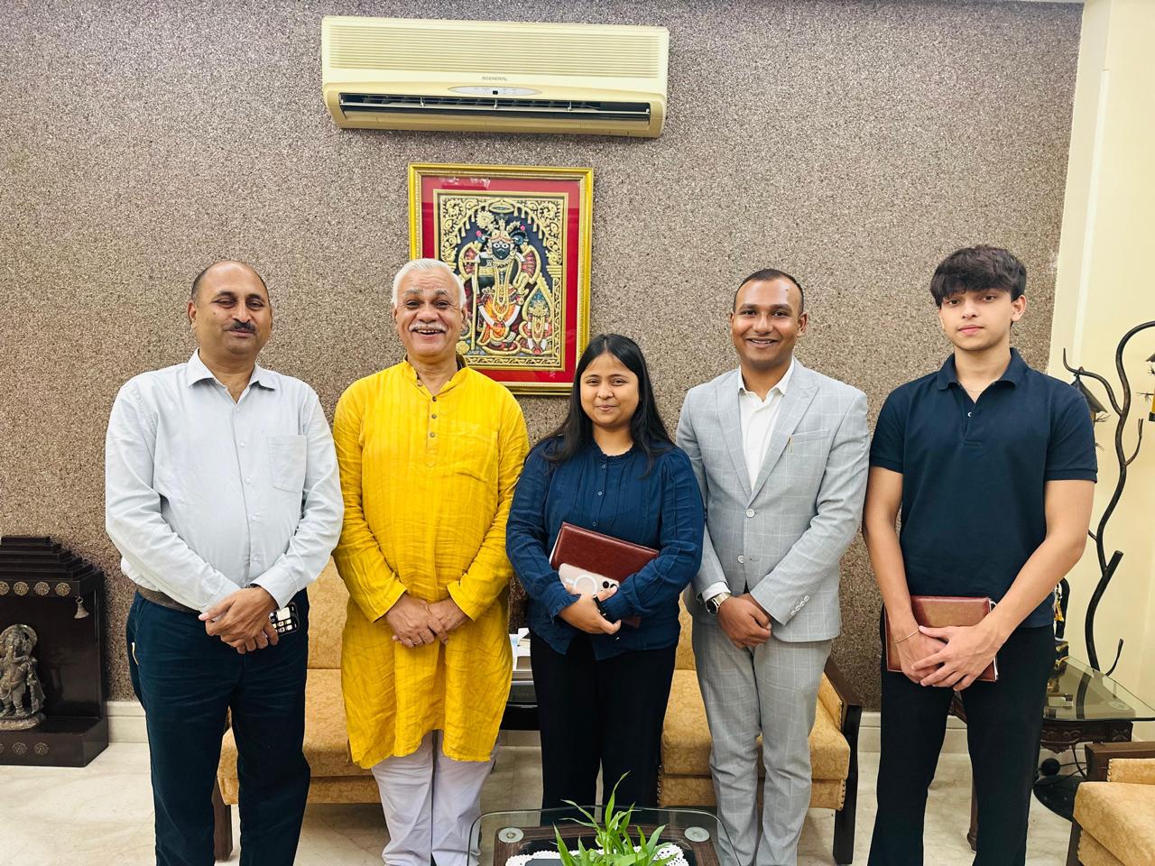 A photograph taken at the Delhi residence of Ex-UP Chief Secretary Durga Shankar Mishra (2nd from left). The image also shows late Rahul Singh (2nd from right), Chandrabhushan Mishra (far left) and his children. (Source: Rahul Singh’s family)
