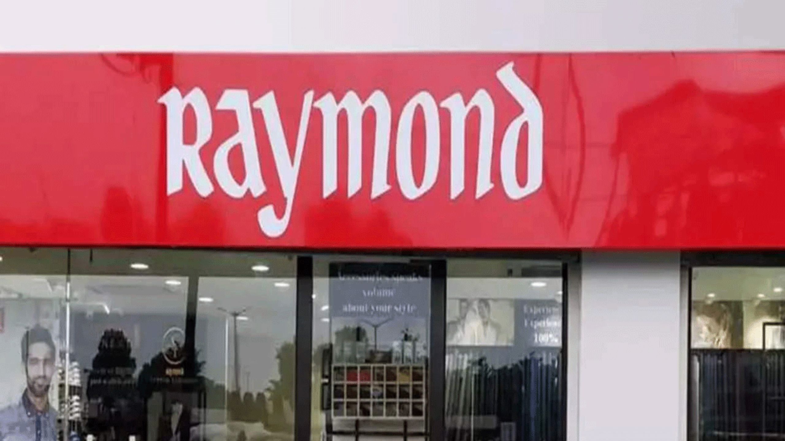 Raymond Share Price: अचानक ही क्यों गिरा रेमंड का इतना शेयर ? वजह उड़ा देगा आपके होश