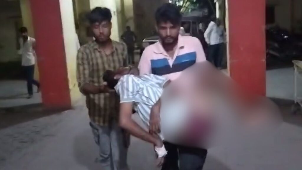 The caretaker arrived carrying the patient in his lap