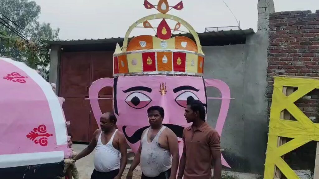 Muslim family making an effigy of Ravana