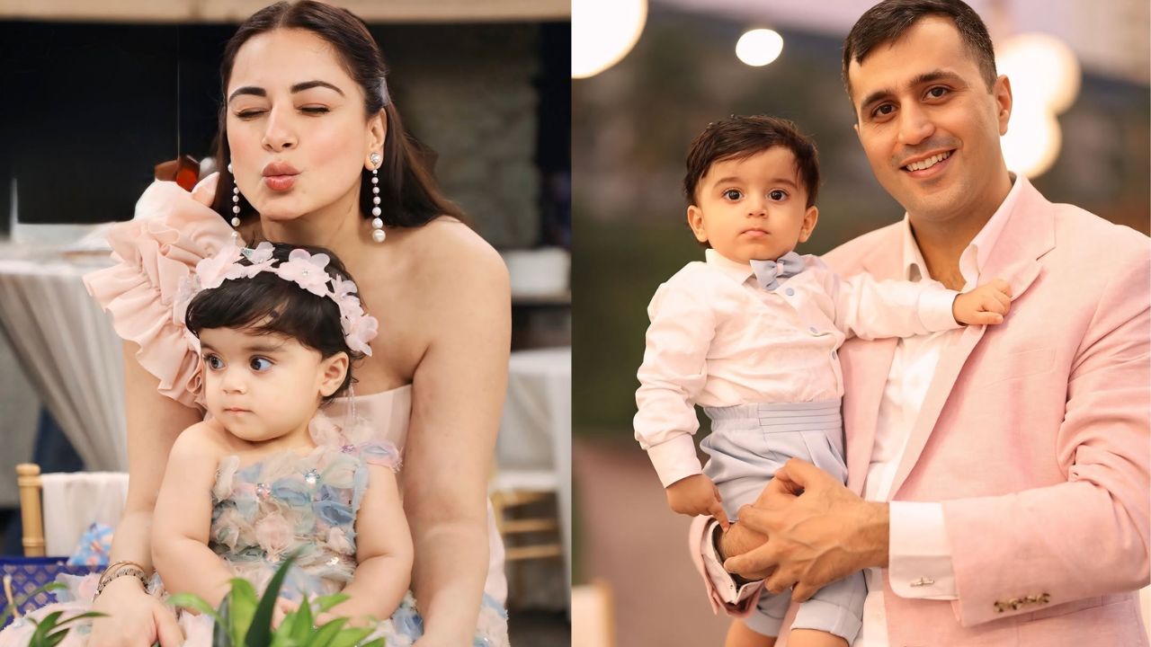 एक तस्वीर में श्रद्धा पिंक वन-शोल्डर ड्रेस में बेटे को गोद में लिए खड़ी हैं, जबकि उनके पति राहुल व्हाइट शर्ट, बेज पैंट और पिंक जैकेट में बेटी को संभाले दिखे। यह परफेक्ट फैमिली फोटो सोशल मीडिया पर खूब वायरल हो रही है। कपल की खुशी और बच्चों की मासूमियत ने इस तस्वीर को और खास बना दिया।  (Img: Instagram)