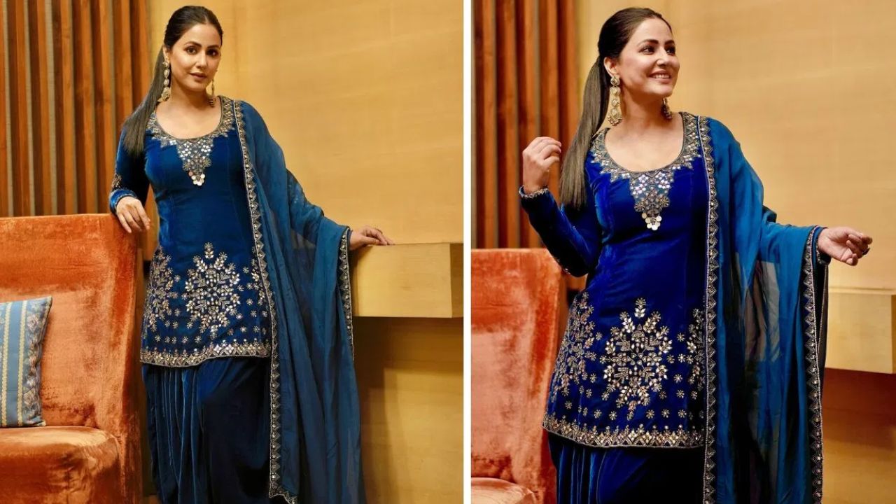 हिना खान का वेलवेट सलवार सूट लोहड़ी के लिए एकदम परफेक्ट है। उन्होंने शॉर्ट वेलवेट कुर्ती के साथ वेलवेट की सलवार पहनी है। अगर आप इस लुक को और ज्यादा पंजाबी बनाना चाहती हैं, तो बालों में परांदा लगाकर इसे ट्रेडिशनल पंजाबी वाइब दे सकती हैं। यह आउटफिट डांस और फेस्टिव फन के लिए बेहद कंफर्टेबल भी है। हिना खान का वेलवेट सलवार सूट लोहड़ी के लिए एकदम परफेक्ट है। उन्होंने शॉर्ट वेलवेट कुर्ती के साथ वेलवेट की सलवार पहनी है। अगर आप इस लुक को और ज्यादा पंजाबी बनाना चाहती हैं, तो बालों में परांदा लगाकर इसे ट्रेडिशनल पंजाबी वाइब दे सकती हैं। यह आउटफिट डांस और फेस्टिव फन के लिए बेहद कंफर्टेबल भी है।