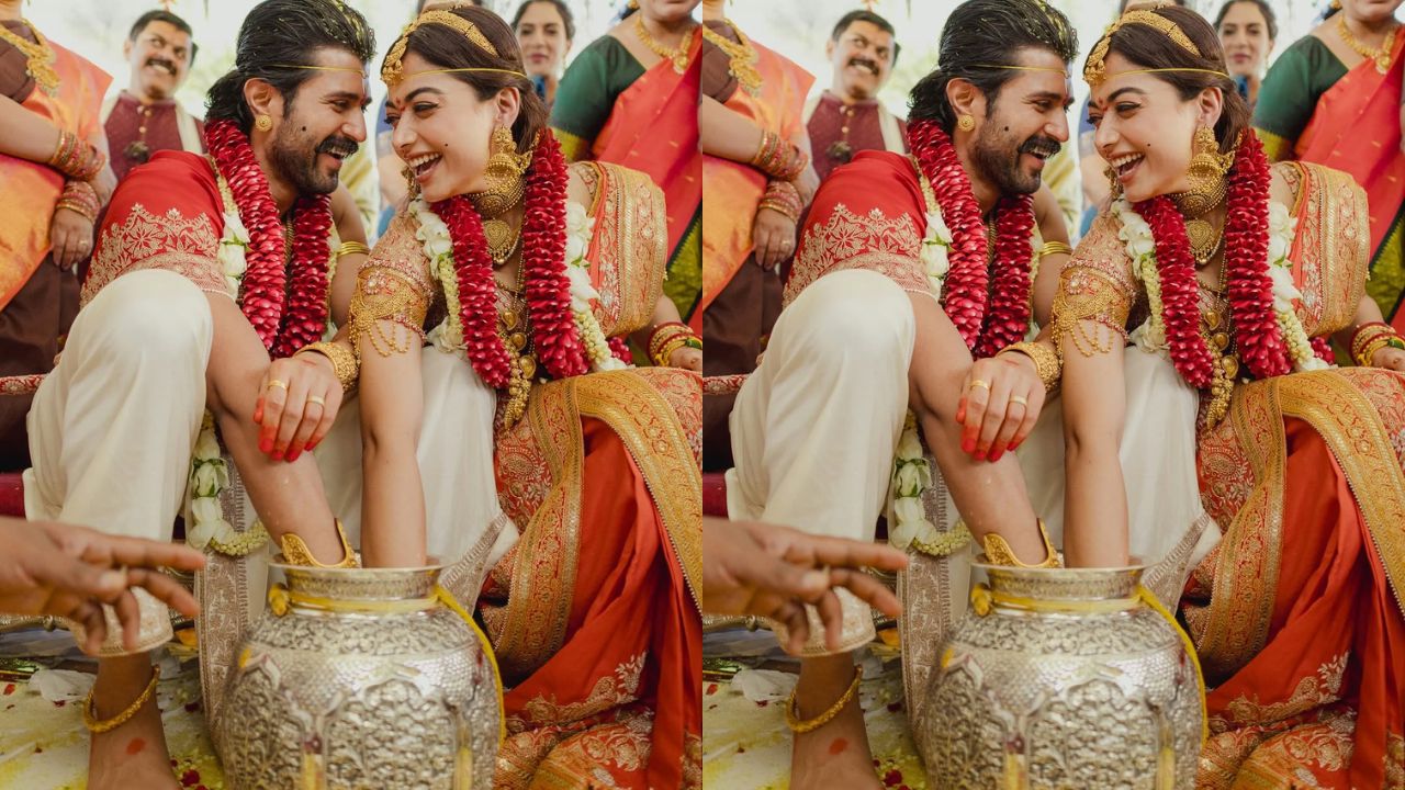 साउथ सिनेमा के चर्चित सितारे रश्मिका मंदाना और विजय देवरकोंडा अब आधिकारिक रूप से मिस्टर एंड मिसेज देवरकोंडा बन चुके हैं। दोनों की शादी की सभी रस्में पूरी हो चुकी हैं और अब जिस पल का फैंस को बेसब्री से इंतजार था, वह भी सामने आ गया है। कपल की शादी की इनसाइड तस्वीरें सोशल मीडिया पर वायरल हो रही हैं। (Img- Instagram)