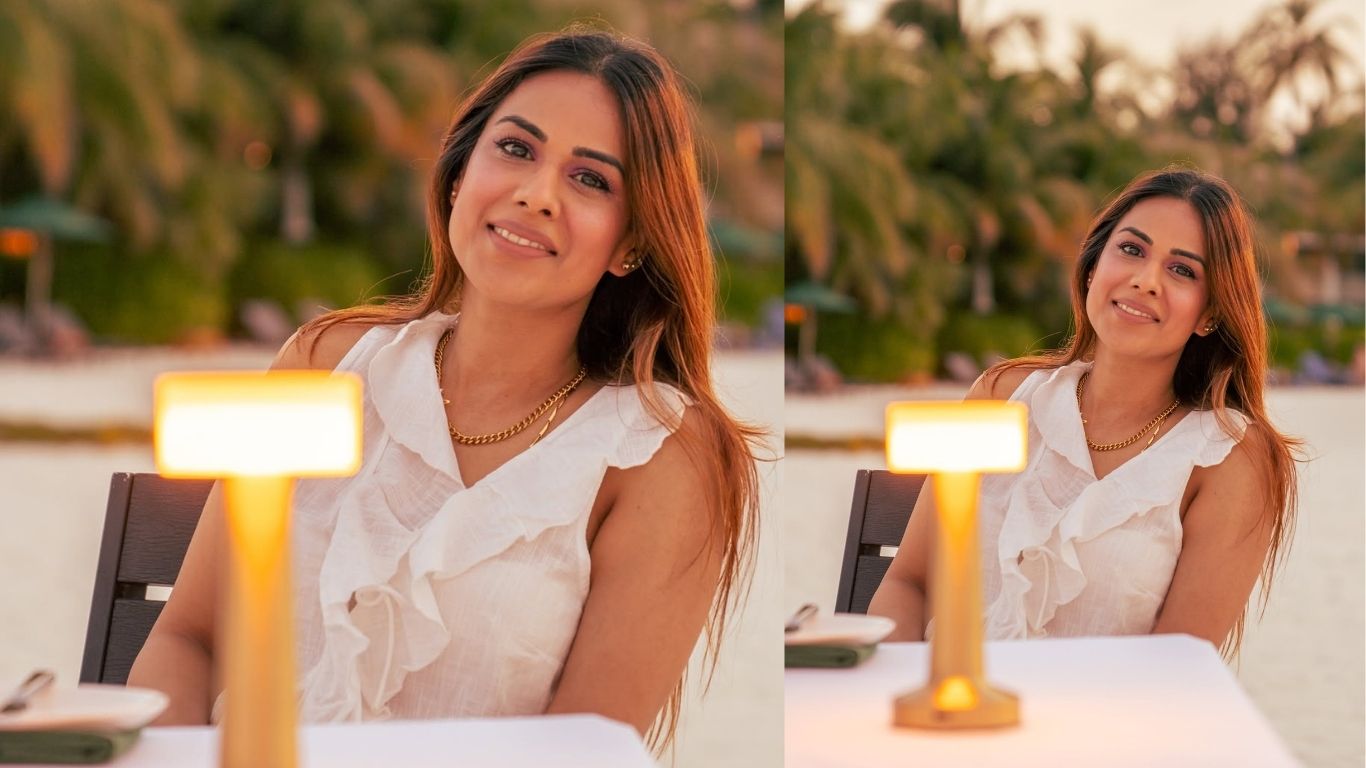 इसके अलावा निया व्हाइट कट-आउट ड्रेस में भी बेहद खूबसूरत लगीं। खुले बाल, न्यूड मेकअप और एलिगेंट स्टाइल में उनका लुक फैंस को काफी पसंद आ रहा है। निया शर्मा की इन तस्वीरों पर फैंस जमकर प्यार बरसा रहे हैं। सोशल मीडिया यूजर्स उनकी पोस्ट पर फायर और हार्ट इमोजी के साथ रिएक्शन दे रहे हैं। उनके बोल्ड और ग्लैमरस अंदाज की तारीफ करते हुए फैंस थक नहीं रहे हैं।