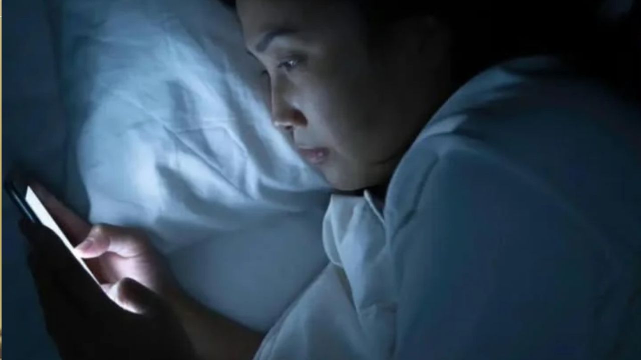 using phone while sleeping