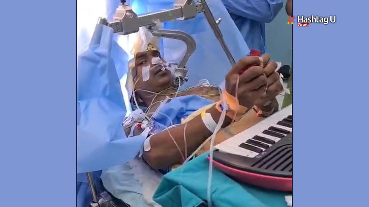 Man Plays Piano