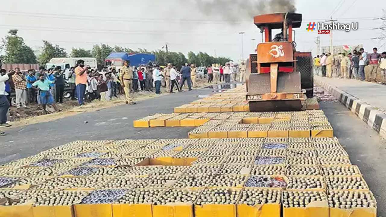 Police Destroy Liquor Bottl