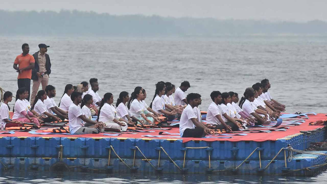 Yoga on boats at Beram Park, Vijayawada.. a unique program that created a world record