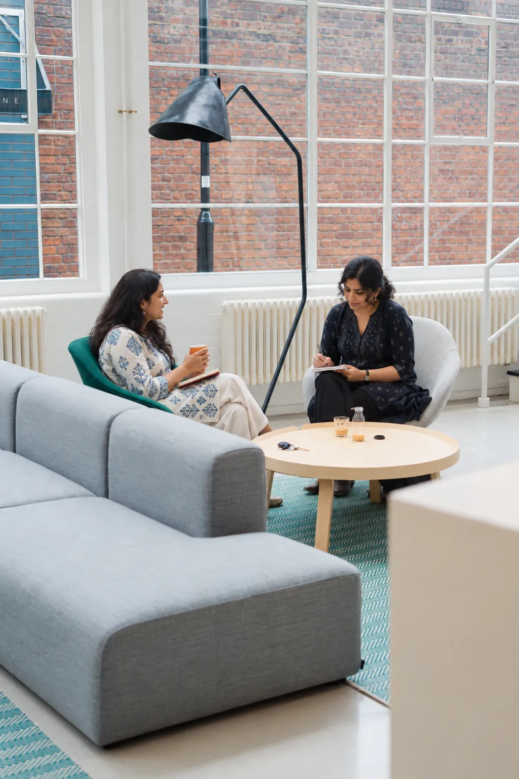 Counselor meets a woman in a lounge