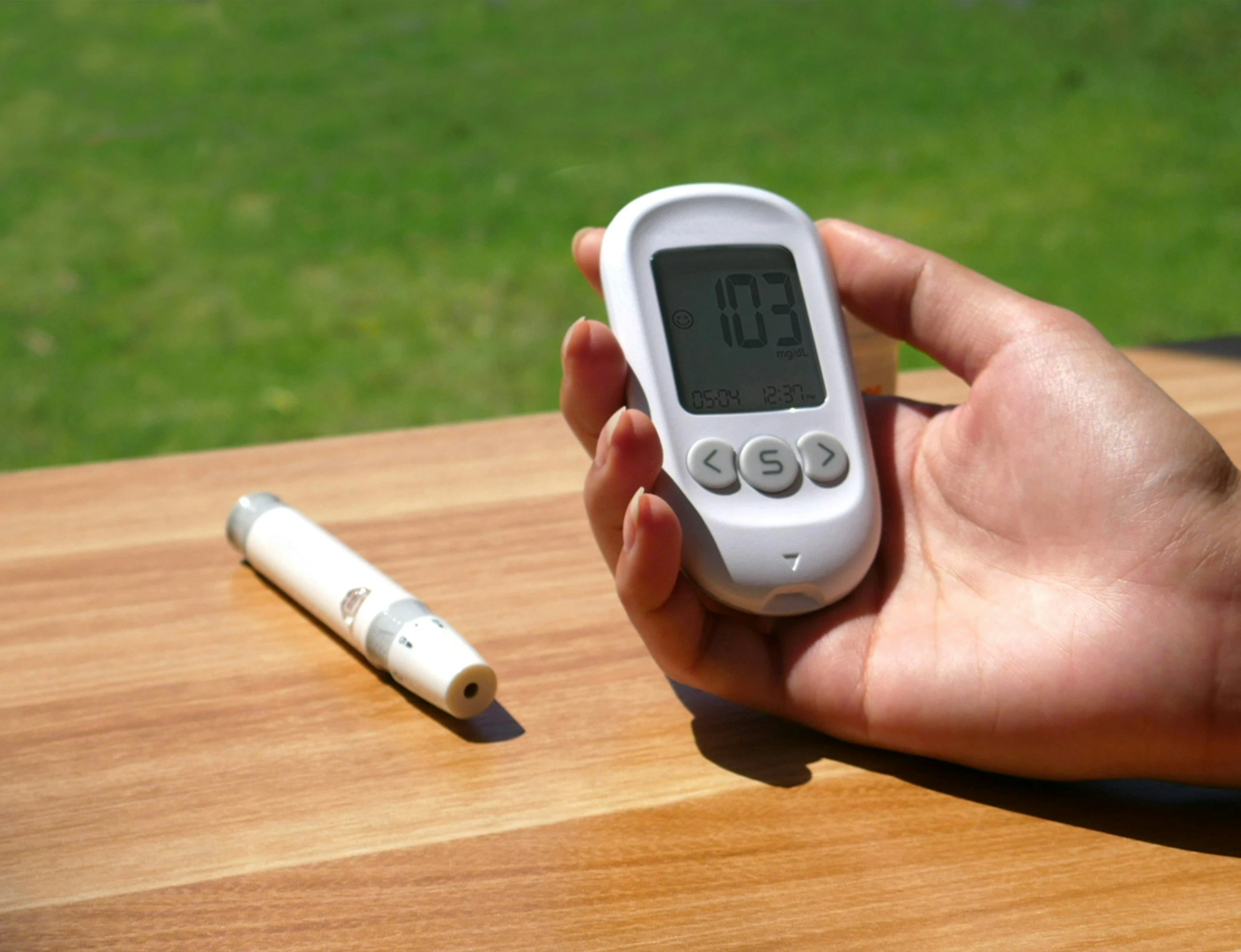 TGHC nurse conducting a diabetes management home visit and checking blood sugar levels