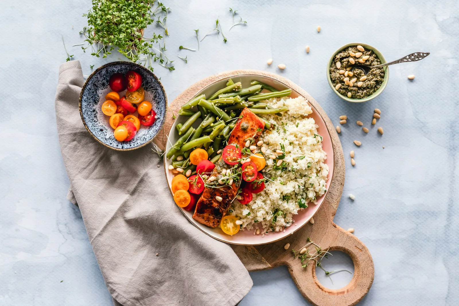 Plated salmon served with vegetables and quinoa