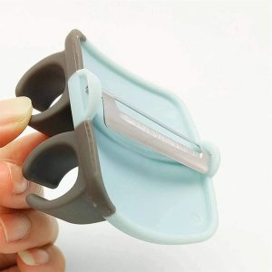 Rubber Finger Grip Hand Peeler for Fruits Vegetables and Potatoes  Handy Kitchen Tool 1Pc of product