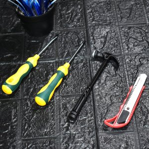 A VERSATILE 4PIECE TOOL SET FOR PLUMBING AND ELECTRICAL REPAIRS IN VARIOUS SETTINGS SUCH AS HOMES AND OFFICE FACILITIES.