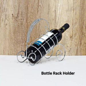 COPPERTONED STAINLESS STEEL WINE BOTTLE RACK HOLDER FOR A SPRING WEDDING PARTY WITH A METAL THEME.