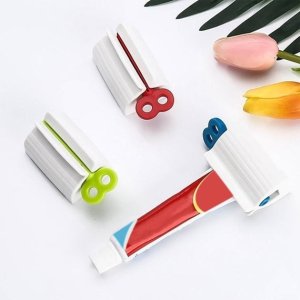 TOOTHPASTE SQUEEZER WITH ROLLING TUBE DESIGN AND HOLDER STAND