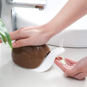 The Portable Snail-shaped Liquid Soap Dispenser, the cutest and most convenient way to keep your hands clean on-the-go!