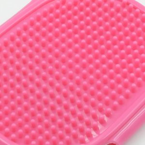 The Dog Bath Brush, a must-have grooming tool for your furry friend.