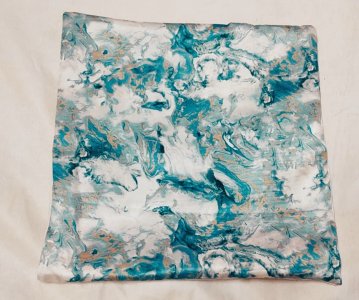 Blue with abstract design on thick glossy smooth textured fabric, set of 5 cushion covers