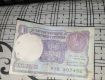 Old 1rs note and coins