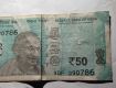 I have a 50 rupees in which 786 is written