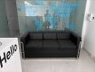 Selling leatherette three seater sofa